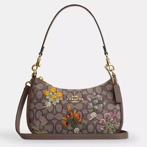 Teri Shoulder Bag
In Signature Jacquard With Floral Embroidery